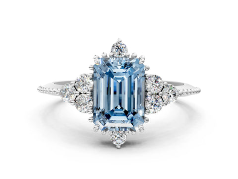 White gold Fancy Blue Emerald Cut Brilliant Diamond with Cluster Setting on a Beaded Band and Four-Prong Setting_24