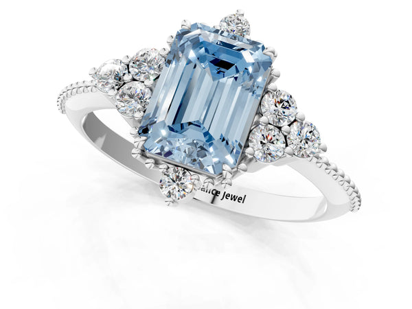 Platinum Fancy Blue Emerald Cut Brilliant Diamond with Cluster Setting on a Beaded Band and Four-Prong Setting