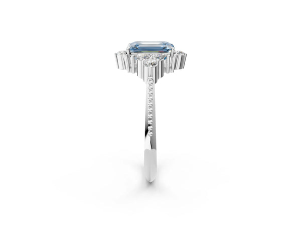 Platinum Fancy Blue Emerald Cut Brilliant Diamond with Cluster Setting on a Beaded Band and Four-Prong Setting