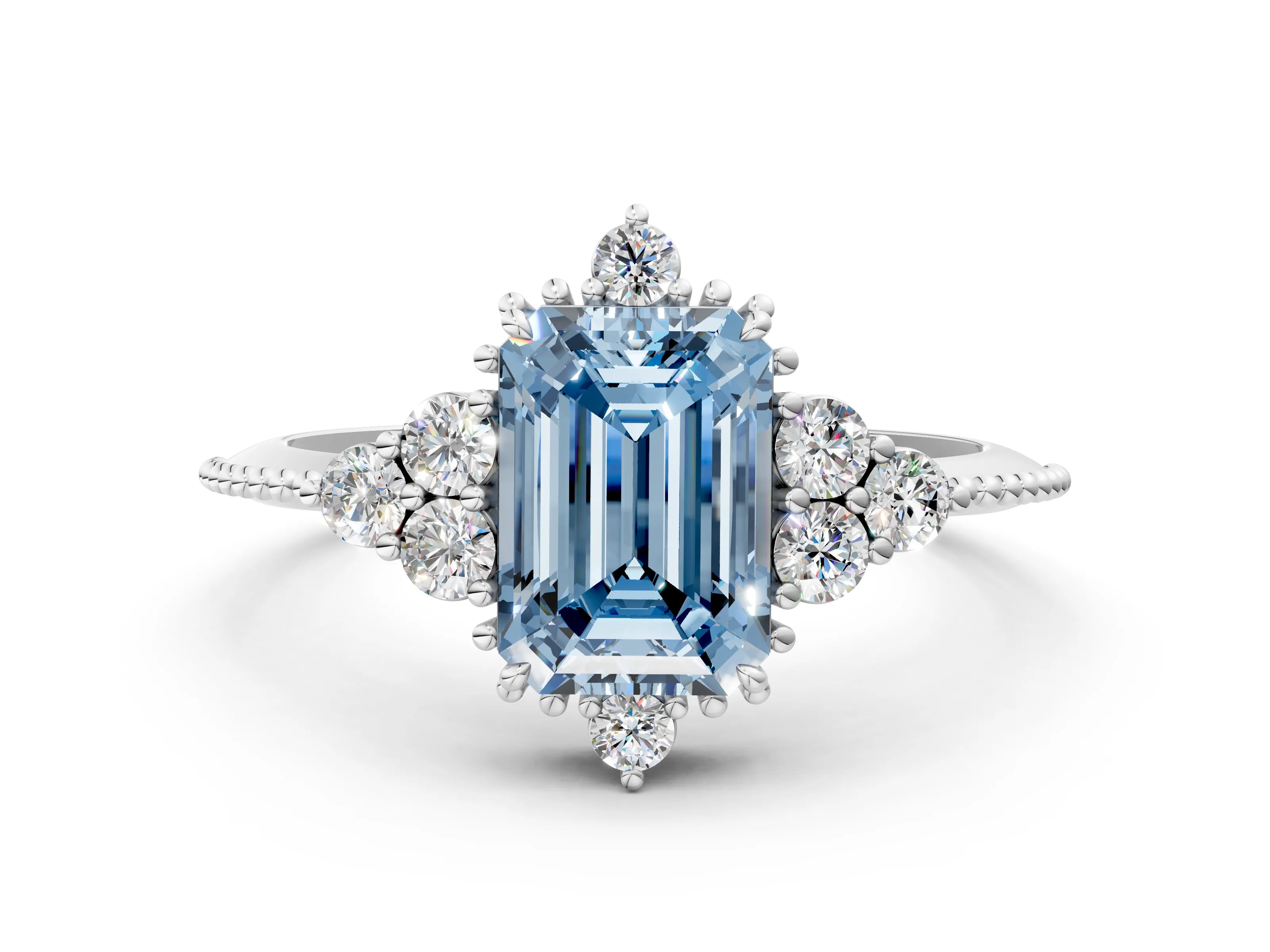 White gold Fancy Blue Emerald Cut Brilliant Diamond with Cluster Setting on a Beaded Band and Four-Prong Setting