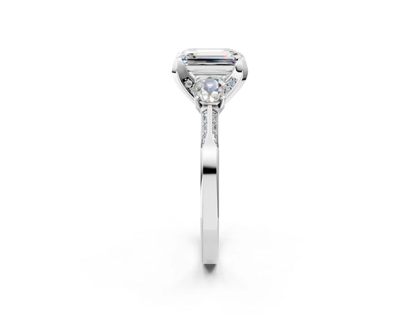White gold Fancy Blue Emerald Cut Brilliant Three-Stone Diamond Ring with Pavé Band and Four-Prong Setting