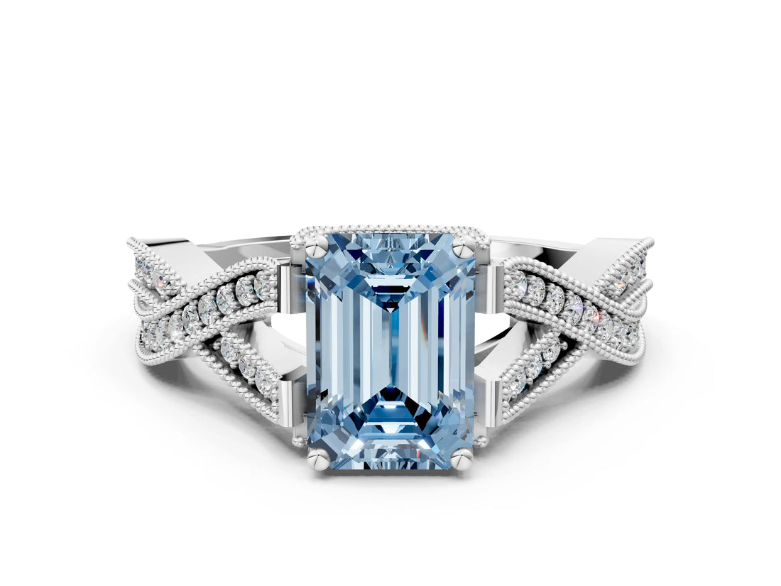 White gold Fancy Blue Emerald Cut Cut Diamond Twisted Band with Milgrain Pave Setting and Four-Prong Setting