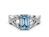 White gold Fancy Blue Emerald Cut Cut Diamond Twisted Band with Milgrain Pave Setting and Four-Prong Setting