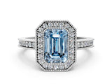 White gold Fancy Blue Emerald Cut Cut Halo Pavé Diamond Ring