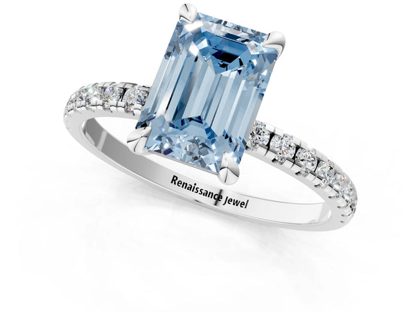 Platinum Fancy Blue Emerald Cut Diamond Brilliant Solitaire Ring with Pavé Band and Four-Prong Setting