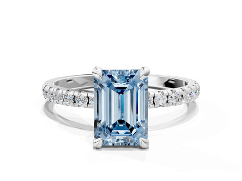 White gold Fancy Blue Emerald Cut Diamond Brilliant Solitaire Ring with Pavé Band and Four-Prong Setting
