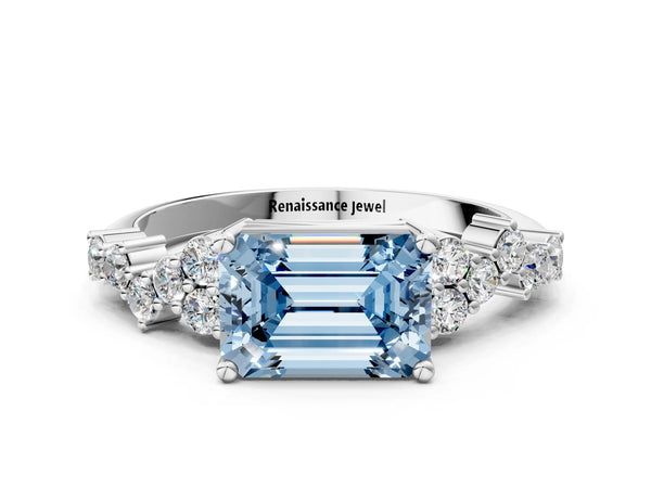 White gold Fancy Blue Emerald Cut Diamond Cluster Pavé Band with Four-Prong Setting