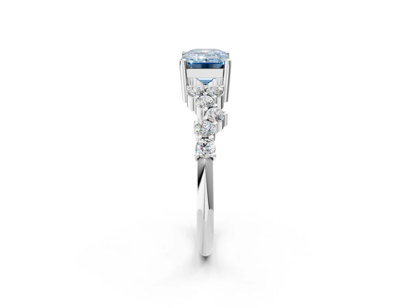 White gold Fancy Blue Emerald Cut Diamond Cluster Pavé Band with Four-Prong Setting
