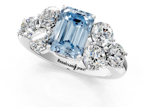 Platinum Fancy Blue Emerald  Cut Diamond Cluster Ring with Round Accent Stones and Prong Setting on a Classic Band