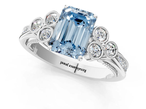 White gold Fancy Blue Emerald  Cut Diamond Engagement Ring with Bezel Set Round Side Stones and Prong Setting