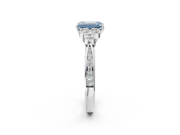 White gold Fancy Blue Emerald  Cut Diamond Engagement Ring with Bezel Set Round Side Stones and Prong Setting