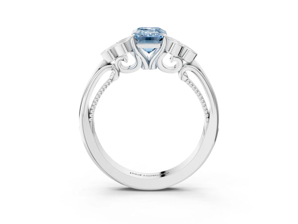 White gold Fancy Blue Emerald  Cut Diamond Engagement Ring with Bezel Set Round Side Stones and Prong Setting
