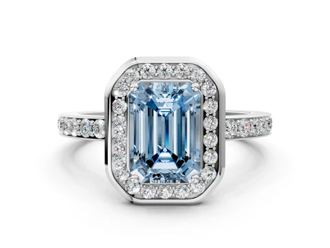 White gold Fancy Blue Emerald Cut Diamond Halo Ring with Bezel Frame and Pavé Band