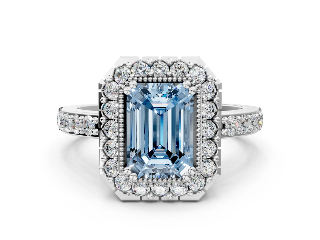 White gold Fancy Blue Emerald Cut Diamond Halo Ring with Pavé Band and Prong Setting