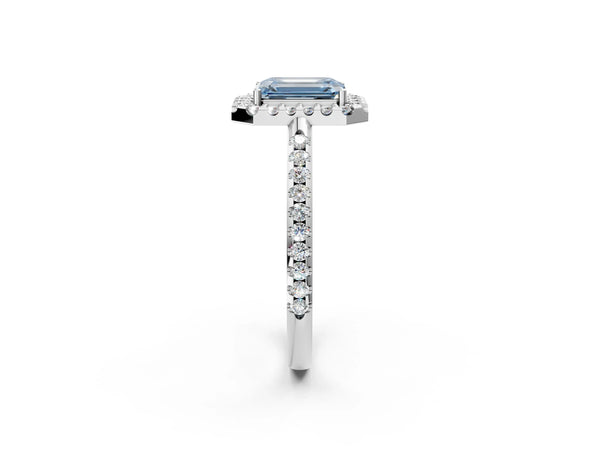 White gold Fancy Blue Emerald Cut Diamond Pavé Halo Ring with Four-Prong Setting