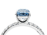 White gold Fancy Blue Emerald Cut Diamond Pavé Solitaire Ring with Round Band and Prong Setting_17