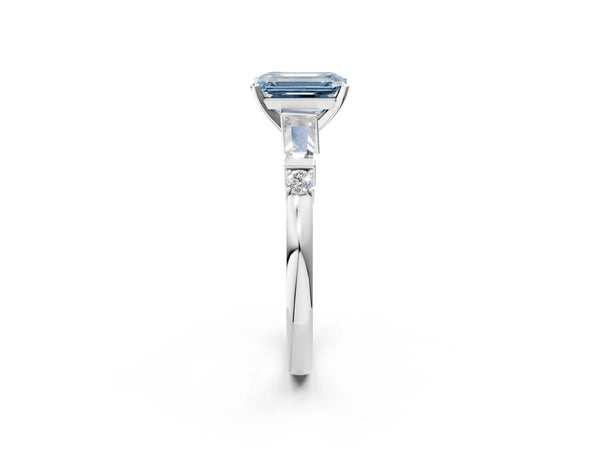 Platinum Fancy Blue Emerald  Cut Diamond Ring with Baguette Side Stones, Channel Set Band, and Four-Prong Setting
