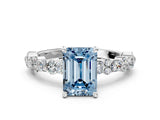 White gold Fancy Blue Emerald Cut Diamond Side Stone Solitaire Ring with Round  and Four-Prong Setting_124