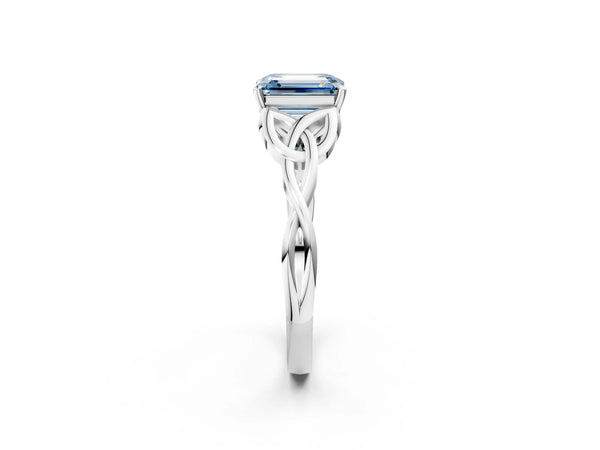 White gold Fancy Blue Emerald Cut Diamond Solitaire Celtic Knot Ring with Four-Prong Setting