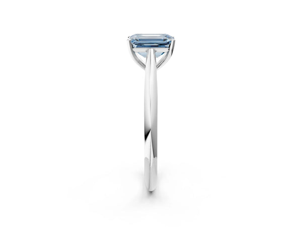 Platinum Fancy Blue Emerald Cut Diamond Solitaire Engagement Ring with Cathedral Setting and Four-Prong Mount