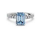 White gold Fancy Blue Emerald Cut Diamond Solitaire Pavé Engagement Ring with Round Band and Prong Setting_86