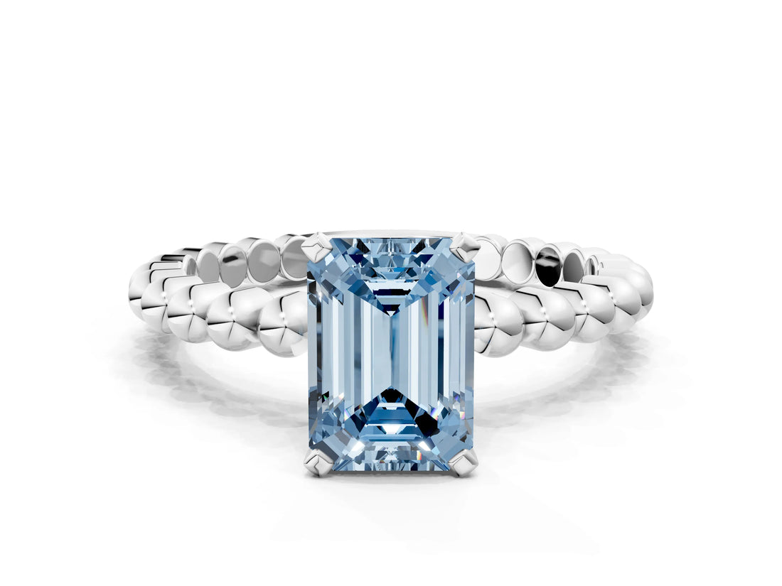 White gold Fancy Blue Emerald Cut Diamond Solitaire Ring with Beaded Band and Prong Setting_390