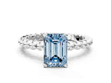 White gold Fancy Blue Emerald Cut Diamond Solitaire Ring with Beaded Band and Prong Setting_390