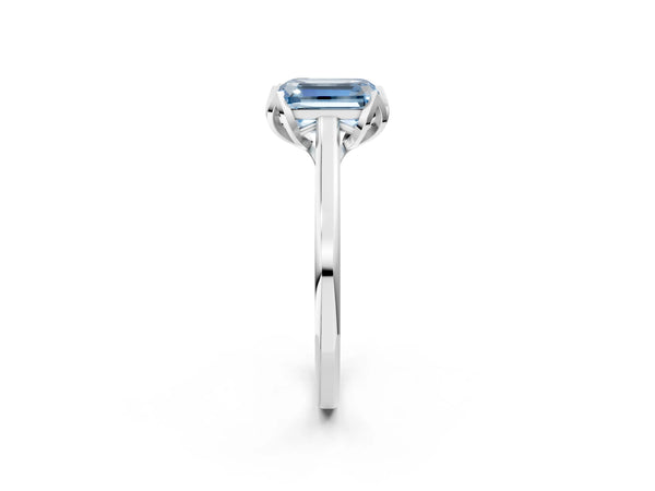 White gold Fancy Blue Emerald Cut Diamond Solitaire Ring with Flower Prong Setting and Classic Band