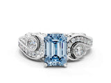 White gold Fancy Blue Emerald Cut Diamond Solitaire Ring with Milgrain Pavé Band and Four-Prong Setting_306