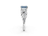 White gold Fancy Blue Emerald Cut Diamond Solitaire Ring with Milgrain Pavé Band and Four-Prong Setting_309