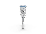 White gold Fancy Blue Emerald Cut Diamond Solitaire Ring with Milgrain Pavé Band and Four-Prong Setting_326