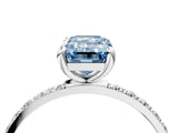 White gold Fancy Blue Emerald Cut Diamond Solitaire Ring with Round  Pavé Band and Prong Setting_172