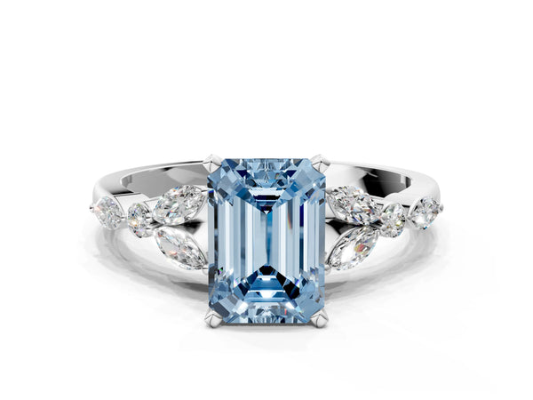 White gold Fancy Blue Emerald Cut Diamond Solitaire Ring with Side Stones and Four-Prong Setting