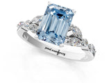 White gold Fancy Blue Emerald Cut Diamond Solitaire Ring with Side Stones and Four-Prong Setting_263