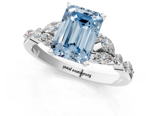 White gold Fancy Blue Emerald Cut Diamond Solitaire Ring with Side Stones and Four-Prong Setting