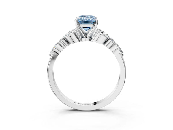 White gold Fancy Blue Emerald Cut Diamond Solitaire Ring with Side Stones and Four-Prong Setting