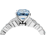 White gold Fancy Blue Emerald Cut Diamond Solitaire Ring with Side Stones and Four-Prong Setting_279