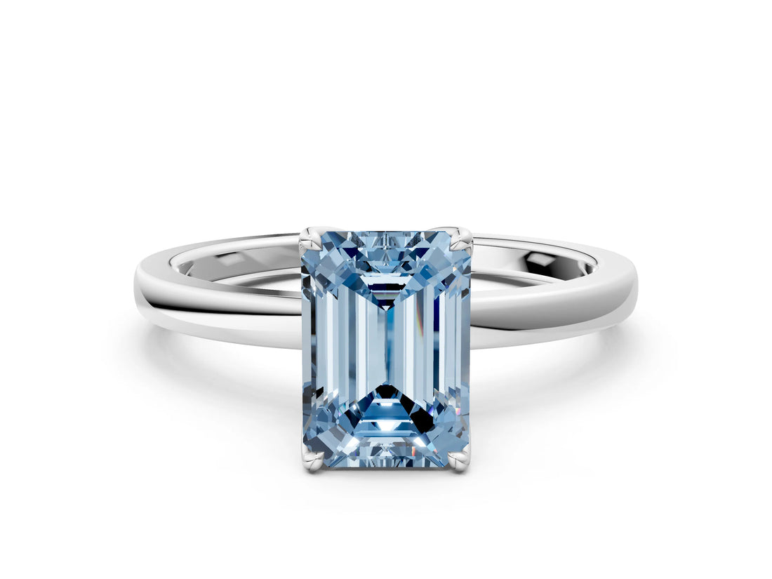 White gold Fancy Blue Emerald Cut Diamond Solitaire Ring with Thin Band and Prong Setting_32