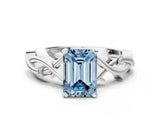 White gold Fancy Blue Emerald Cut Diamond Solitaire Ring with Twisted Band and Prong Setting_324