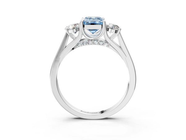 White gold Fancy Blue Emerald Cut Diamond Three-Stone Engagement Ring with Prong Setting and Pavé Band