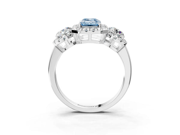 White gold Fancy Blue Emerald Cut Diamond Three-Stone Halo Ring with Prong Setting and Pavé Accents