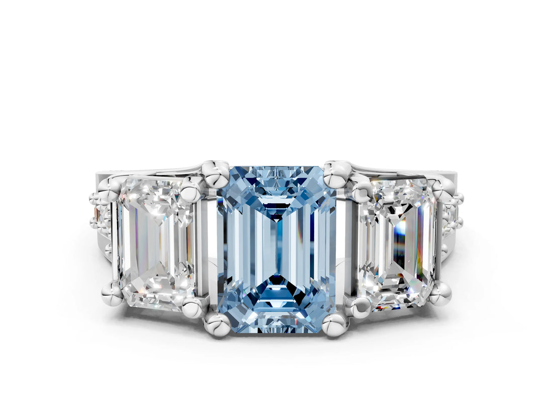 White gold Fancy Blue Emerald Cut Diamond Three-Stone Ring with Channel Set Band and Four-Prong Setting_81