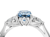 White gold Fancy Blue Emerald Cut Diamond Three-Stone Ring with Pear  Side Stones and Prong Setting_101