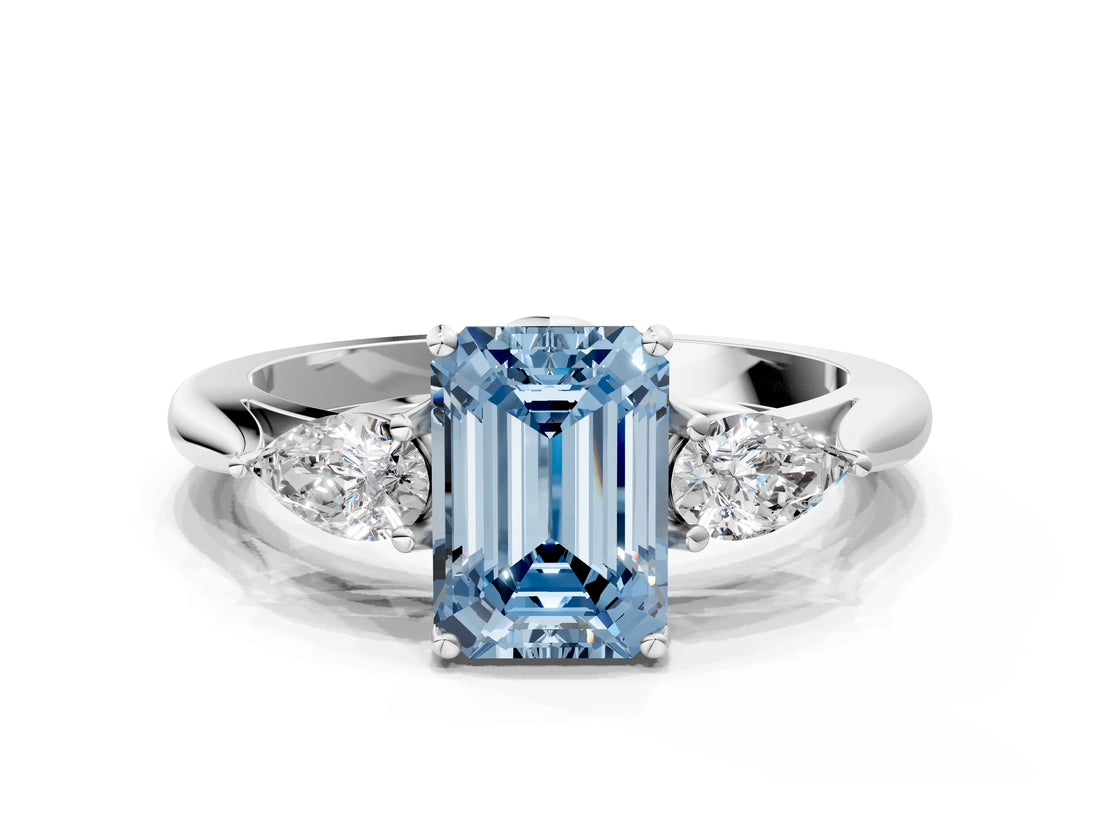 White gold Fancy Blue Emerald Cut Diamond Three-Stone Ring with Pear  Side Stones and Prong Setting_99
