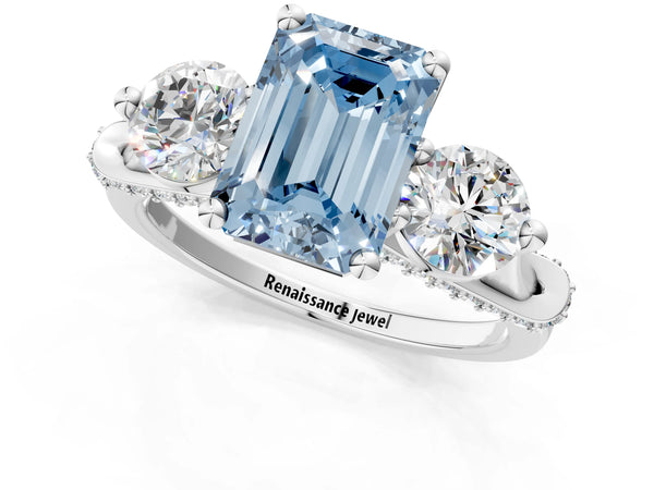 White gold Fancy Blue Emerald Cut Diamond Three-Stone Ring with Prong Setting and Pavé Band