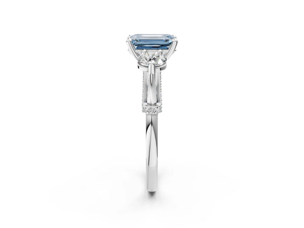 White gold Fancy Blue Emerald Cut Diamond Three-Stone Ring with Prong Setting and Pavé Band