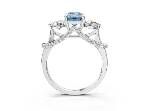 White gold Fancy Blue Emerald Cut Diamond Three-Stone Ring with Prong Setting and Pavé Band