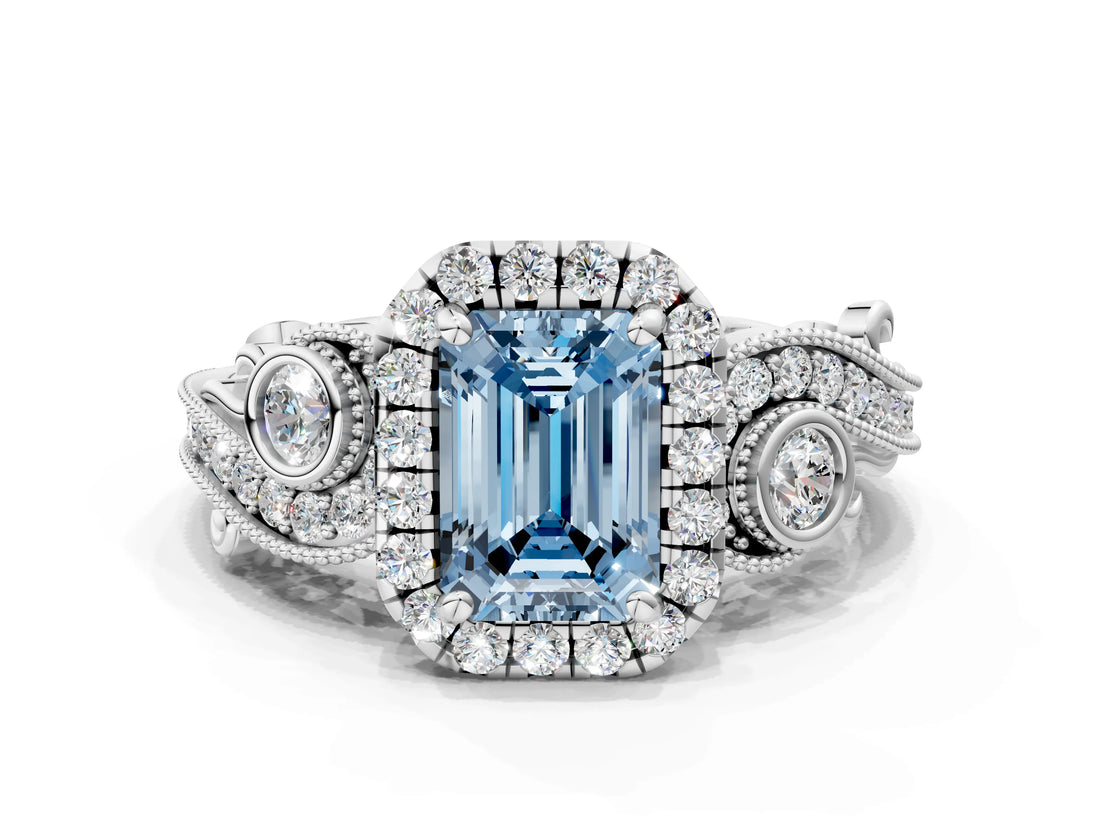 White gold Fancy Blue Emerald Cut Halo Diamond Ring with Milgrain and Bezel Accents on a Split Shank Band_12