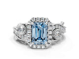 White gold Fancy Blue Emerald Cut Halo Diamond Ring with Milgrain and Bezel Accents on a Split Shank Band_12