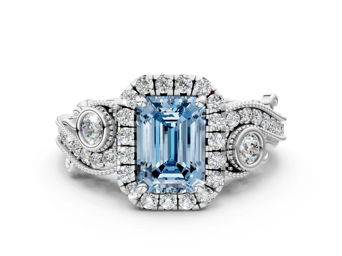 White gold Fancy Blue Emerald Cut Halo Diamond Ring with Milgrain and Bezel Accents on a Split Shank Band_24